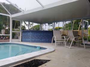 Hollywood pool enclosure with combo roof design
